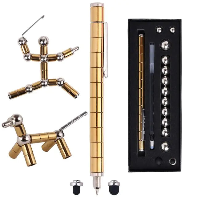 Gold pen with interchangeable components and packaging on a white background