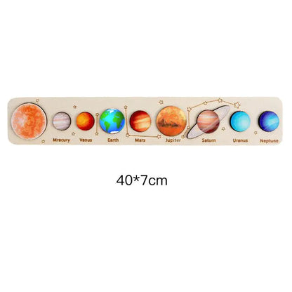 Wooden puzzle with colorful depiction of planets on a white background