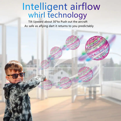 Child playing with a colorful toy airplane in a room with large windows.